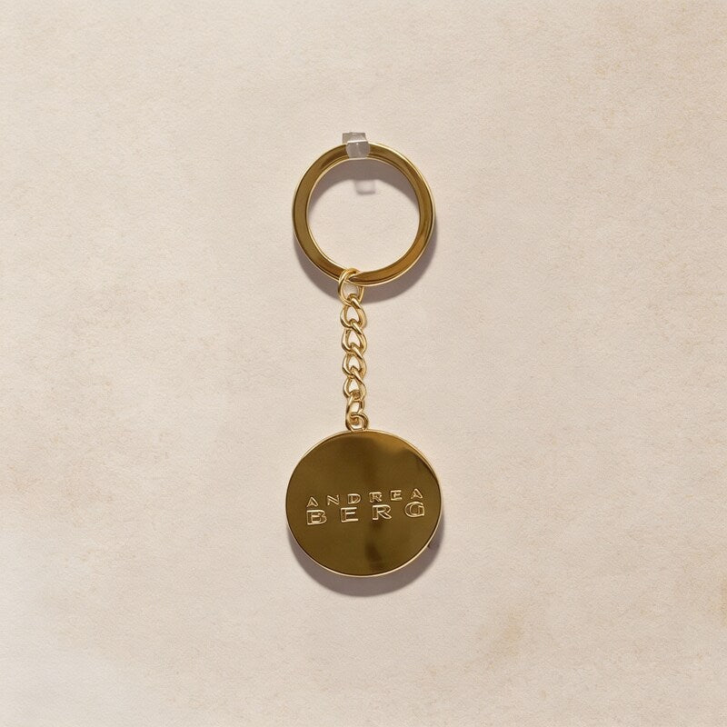 Andrea Berg – Schlüsselanhänger mit Kompass-Motiv in Gold